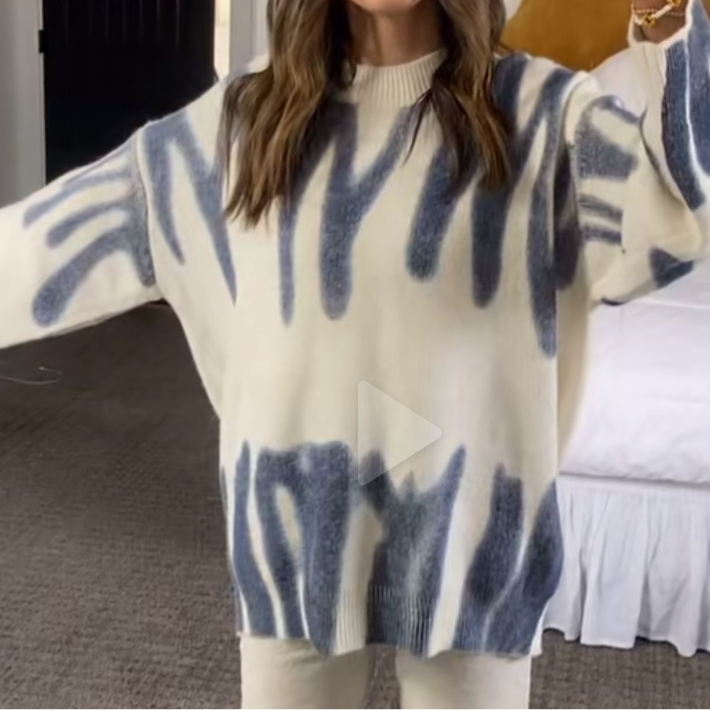 white and blue sweater